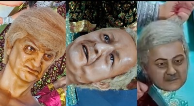 দুর্গাপূজায় অসুর রূপে বিশ্বনেতা: শিল্প না রাজনীতি?