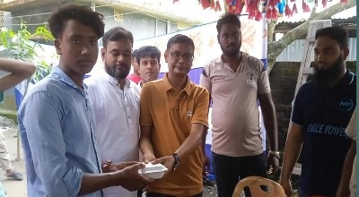 নওগাঁয় বিভিন্ন মন্দিরে অনুদান ও প্রসাদ বিতরণ